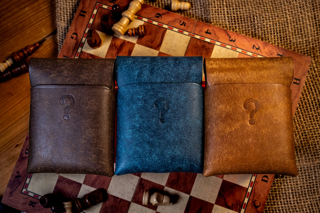 three pueblo leather wallets